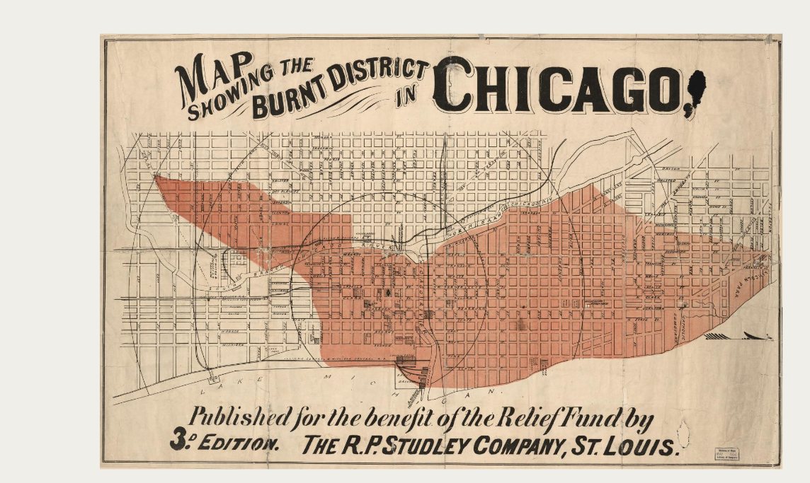 A printed map of Chicago, browned and creased along its folds, with the area destroyed by the 1871 fire washed in salmon red. The burnt ground runs north to south along the lake and spreads west of the river; the street grid is drawn across the whole sheet, burnt and unburnt alike.